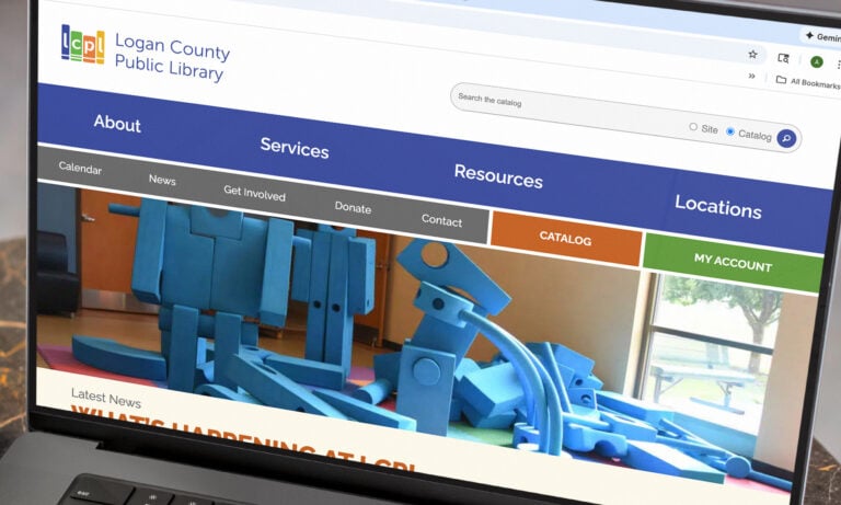 Logan County Public Library website on a laptop